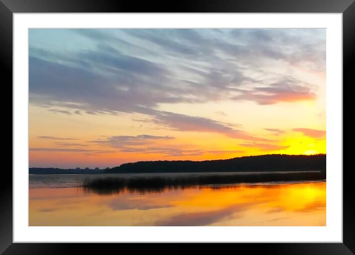 Sunset over a lake in France Framed Mounted Print by Patricija Jaunaraja