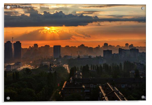 The sun's rays break through the rain clouds of a cloud at dawn and illuminate a sleeping city. Acrylic by Sergii Petruk