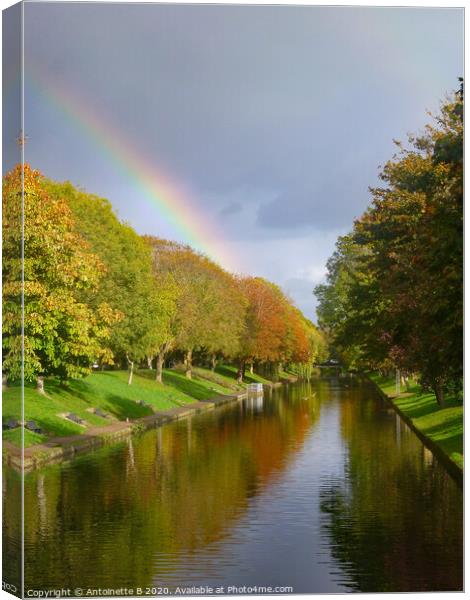 Rainbow over the Canal in Hythe  Canvas Print by Antoinette B