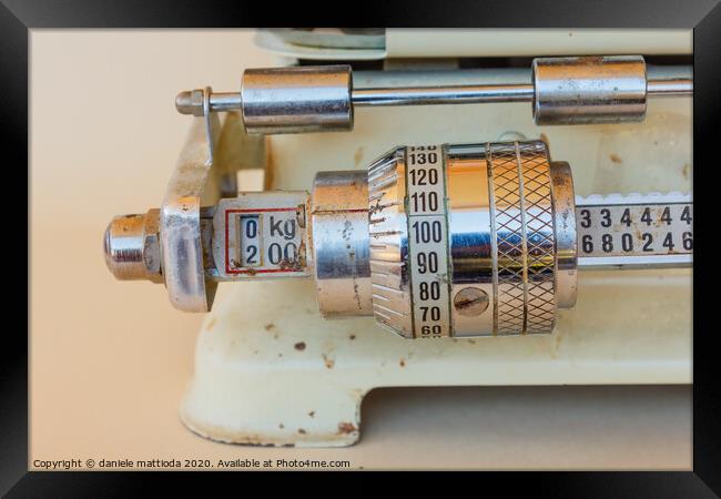 close-up of a mechanical gauge of a weight scale Framed Print by daniele mattioda