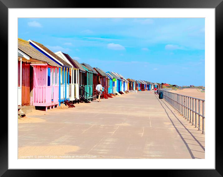 Beach huts on the promenade at Sandilands in Sutton-on-sea, promenade. Framed Mounted Print by john hill