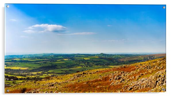 Brentor and Cornwall from Cox Tor, Dartmoor. Acrylic by Maggie McCall