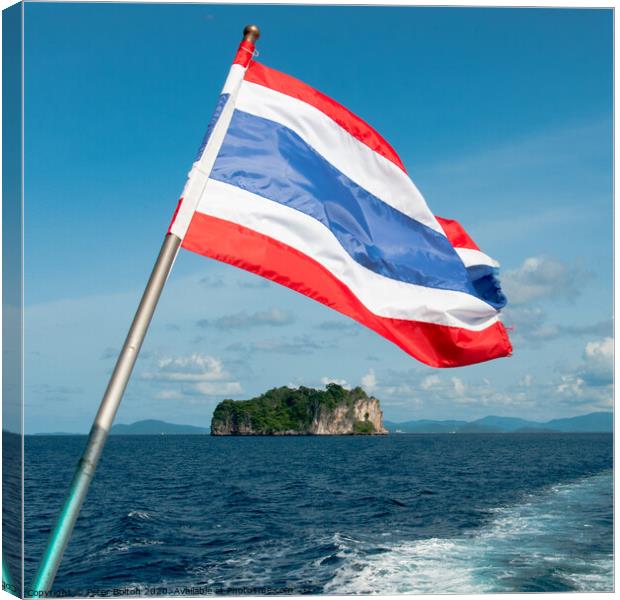 Thailand national flag flying from the stern of a boat. Phang Nga Bay, Thailand. Canvas Print by Peter Bolton