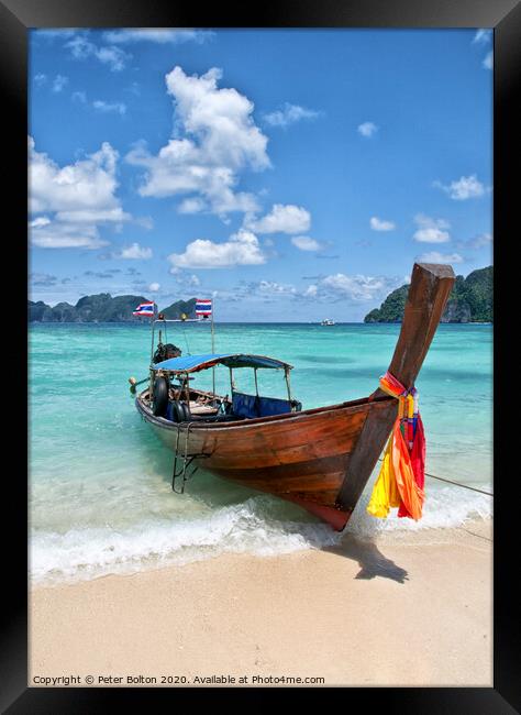 Long-tail boat pulled up on the beach, Phi Phi Island, Thailand. Framed Print by Peter Bolton