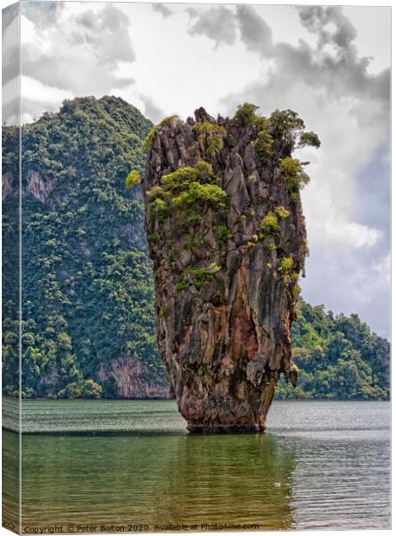A limestone outcrop at Tapoo Island, Thailand. Canvas Print by Peter Bolton