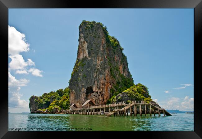 Limestone outcrop with landing stage. Phi Phi Island group, Thailand . Framed Print by Peter Bolton