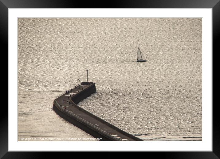 Swansea west pier and yacht in the bay Framed Mounted Print by Bryn Morgan