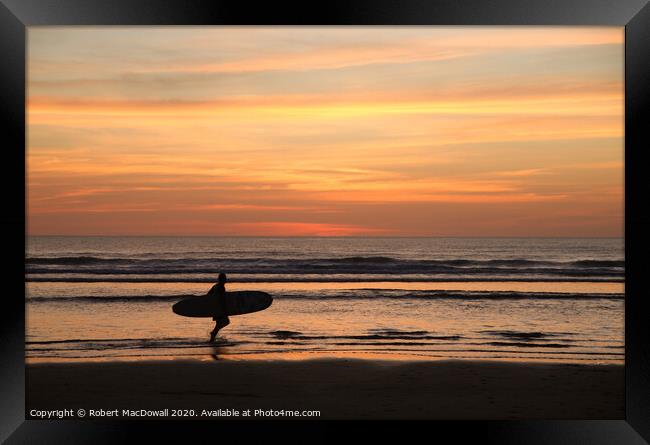 Evening surfer on Piha Beach, New Zealand Framed Print by Robert MacDowall