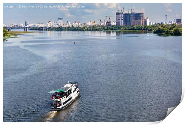 A river tram carries tourists along the Dnipro River along the left bank of Kyiv, top view. Print by Sergii Petruk