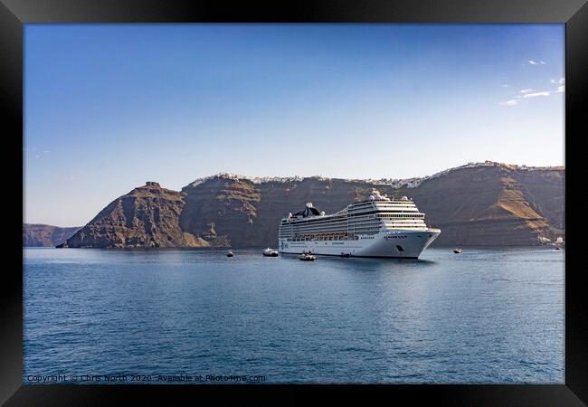 Cruise liner at anchor in Santorini Bay. Framed Print by Chris North