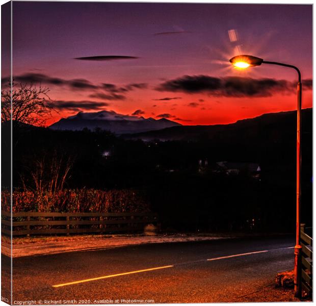 Sunset and street light. Canvas Print by Richard Smith