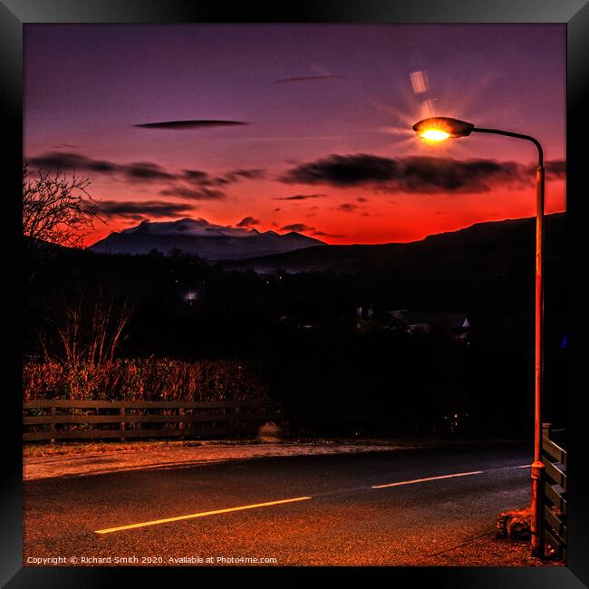 Sunset and street light. Framed Print by Richard Smith