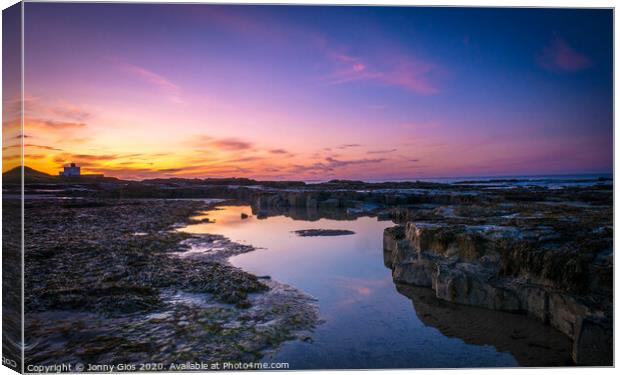 Pools of Water on Bamburgh Beach  Canvas Print by Jonny Gios