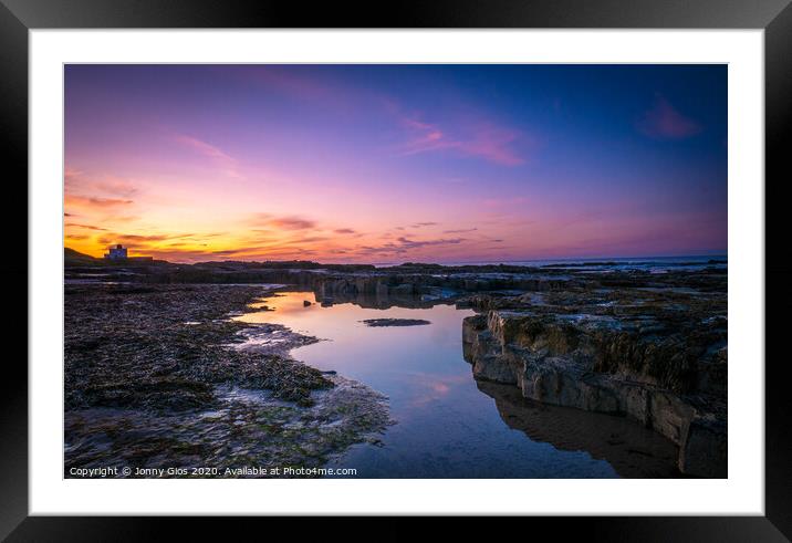 Pools of Water on Bamburgh Beach  Framed Mounted Print by Jonny Gios