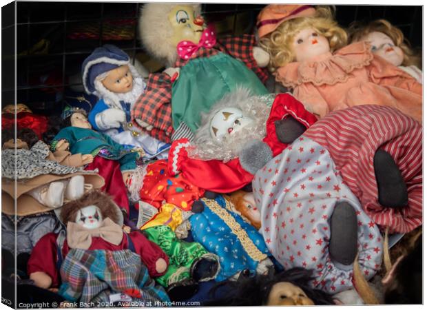 Worn out dolls puppets  on a flea market in Rome, Italy Canvas Print by Frank Bach