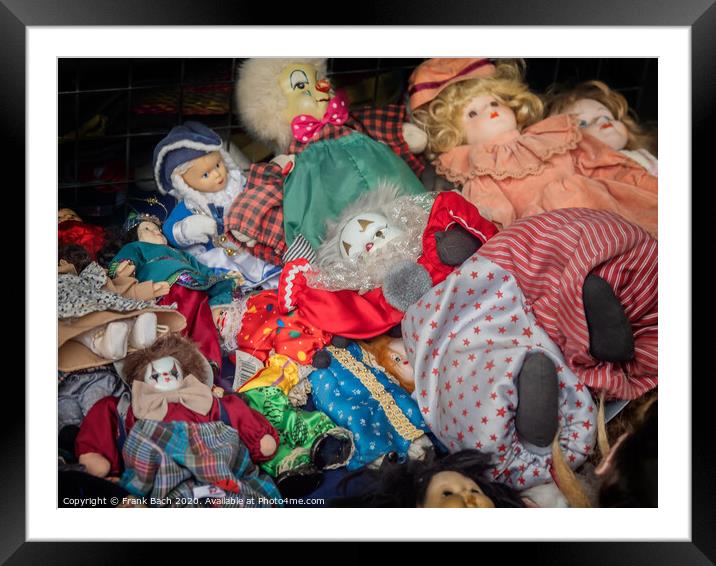 Worn out dolls puppets  on a flea market in Rome, Italy Framed Mounted Print by Frank Bach
