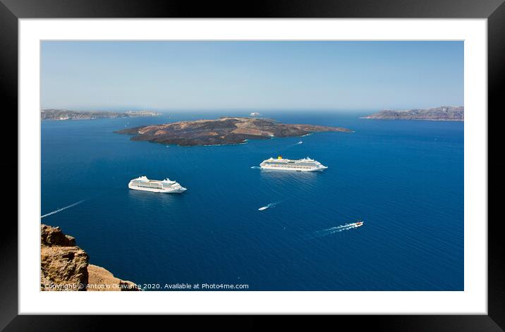 cruise ship near volcano on island of Santorini Framed Mounted Print by Antonio Gravante