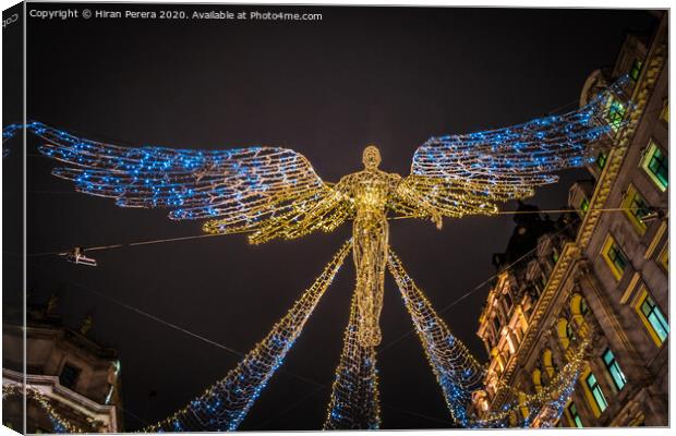 London Christmas Lights, Flying Angel Canvas Print by Hiran Perera