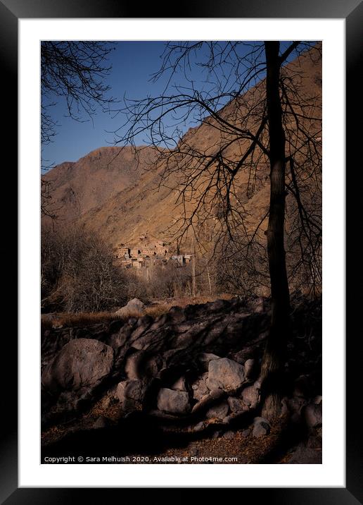 A village nestled in the mountains Framed Mounted Print by Sara Melhuish