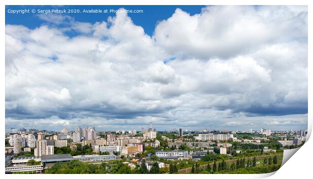 Panorama of Kyiv, with high cloudy skies over residential areas, green parks and a TV tower. Print by Sergii Petruk