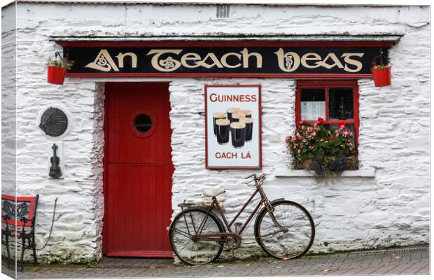 Bicycle outside pub, West Cork, Ireland Canvas Print by Phil Crean