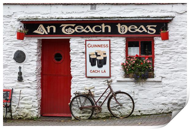 Bicycle outside pub, West Cork, Ireland Print by Phil Crean