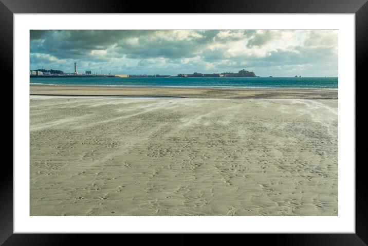 Blowing sand on St Helier beach Framed Mounted Print by Jonathon barnett