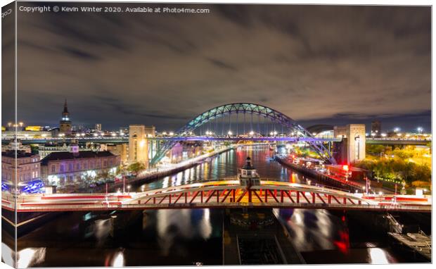 Swing and Tyne bridges Canvas Print by Kevin Winter