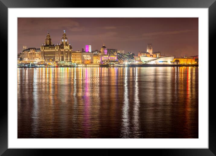 Liverpool waterfront at night and lighting on the River Mersey Framed Mounted Print by Dave Wood