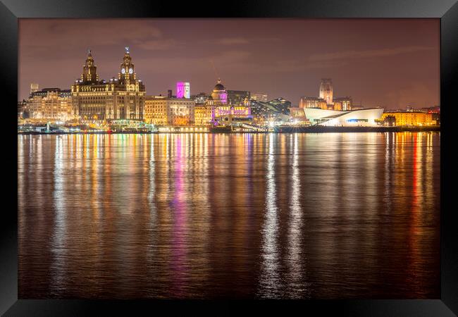 Liverpool waterfront at night and lighting on the River Mersey Framed Print by Dave Wood