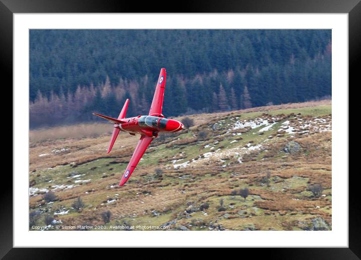 Red Arrows Hawk low level in North Wales Framed Mounted Print by Simon Marlow