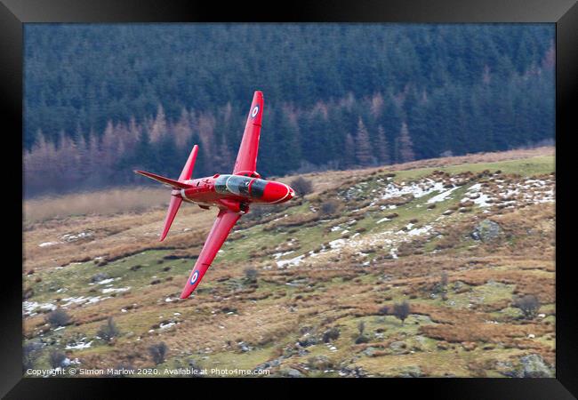 Red Arrows Hawk low level in North Wales Framed Print by Simon Marlow