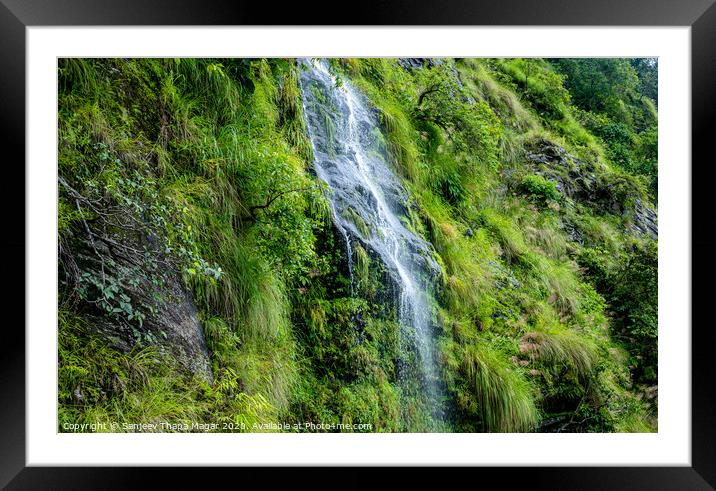 A large waterfall in a forest Framed Mounted Print by Sanjeev Thapa Magar