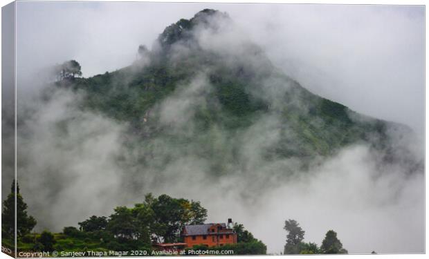 A lonely house and playing clouds Canvas Print by Sanjeev Thapa Magar