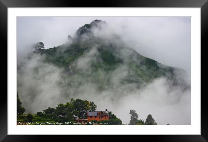 A lonely house and playing clouds Framed Mounted Print by Sanjeev Thapa Magar
