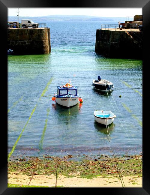 Entrance to Mousehole harbour in Cornwall. Framed Print by john hill