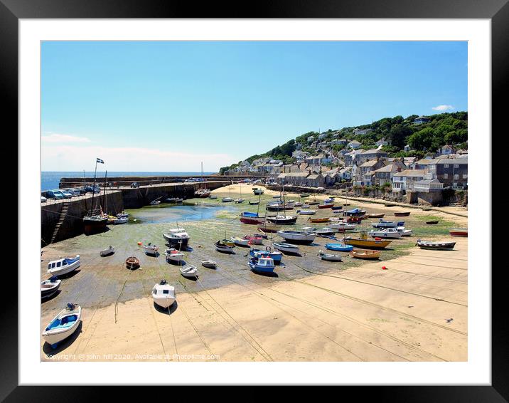 Mousehole harbour at low tide in Cornwall. Framed Mounted Print by john hill