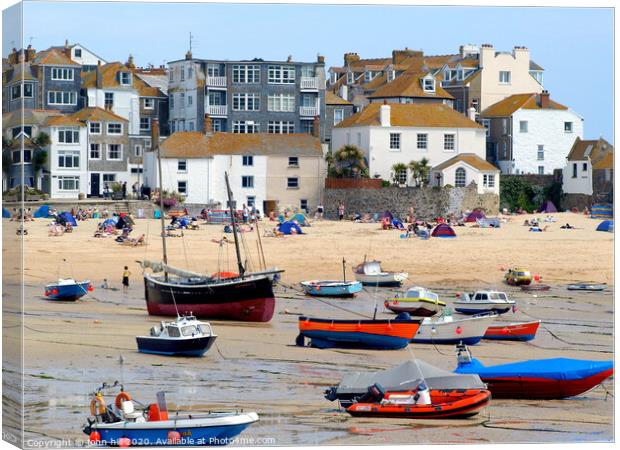 Harbour and beach at low tide in St. Ives at Cornwall. Canvas Print by john hill