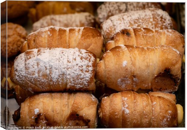 Pile of Pain au Chocolats for sale in a bakery in Trastevere, Ro Canvas Print by Frank Bach