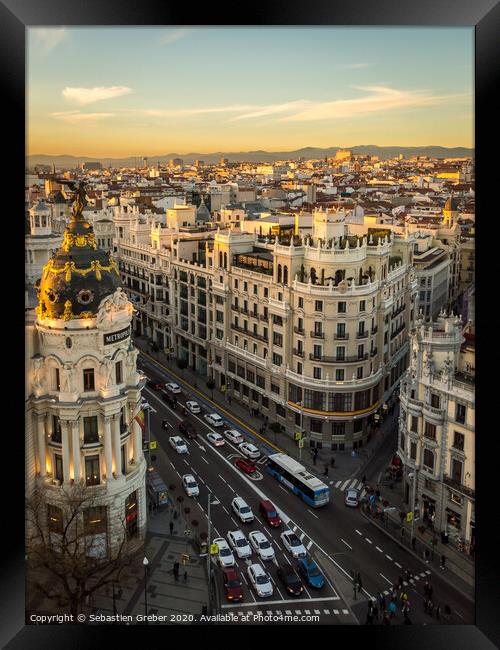 Gran Via Madrid at Sunset Framed Print by Sebastien Greber