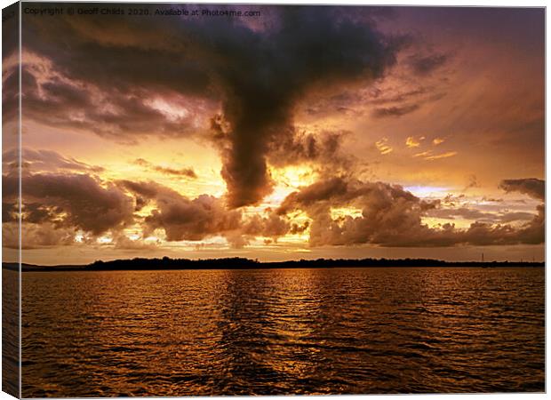 Turbulent golden cloudy seascape sunset. Canvas Print by Geoff Childs