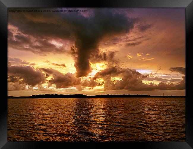 Turbulent golden cloudy seascape sunset. Framed Print by Geoff Childs