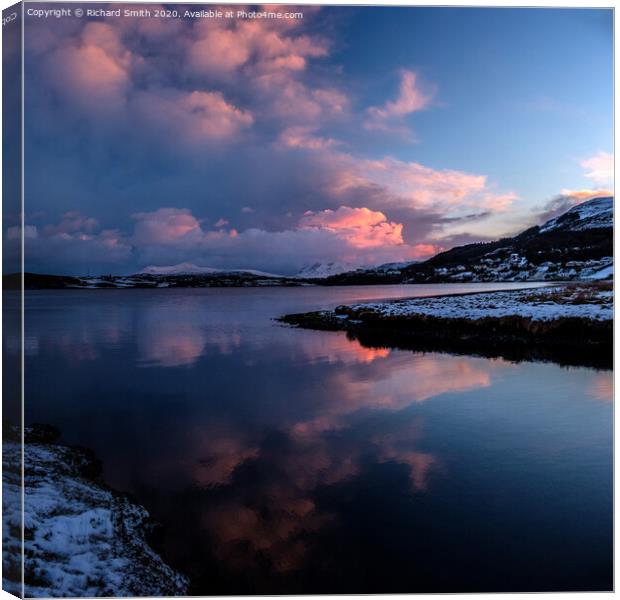 Reflected sunset colour  bounces off cloud and loch. Canvas Print by Richard Smith