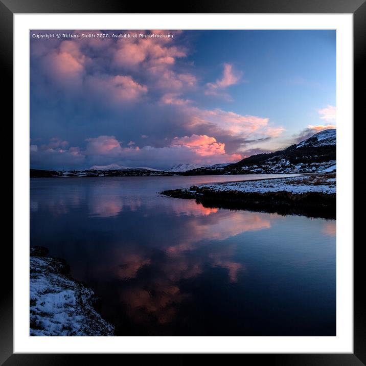 Reflected sunset colour  bounces off cloud and loch. Framed Mounted Print by Richard Smith