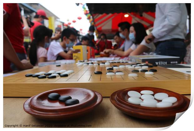 Chinese playing Go Game, Weiqi in a street. Print by Hanif Setiawan