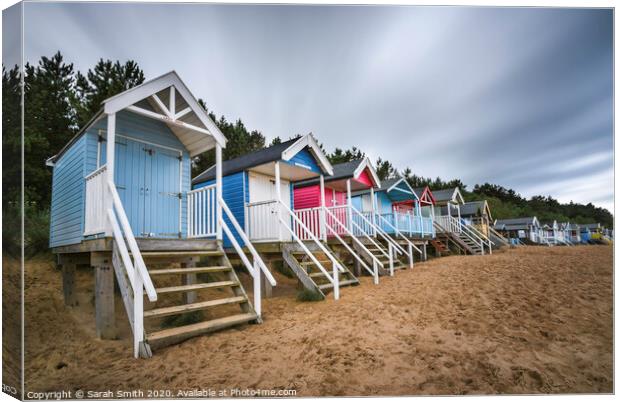 Wells Next The Sea beach huts Canvas Print by Sarah Smith