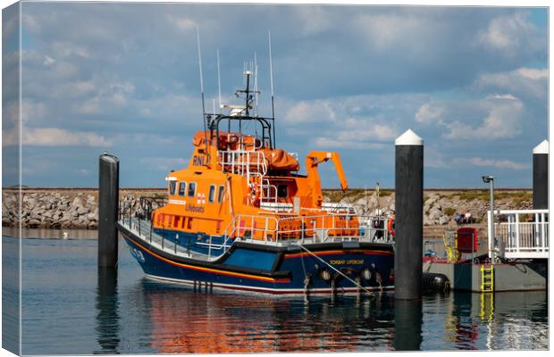 Torbay Lifeboat in Brixham harbour Canvas Print by Wendy Williams CPAGB