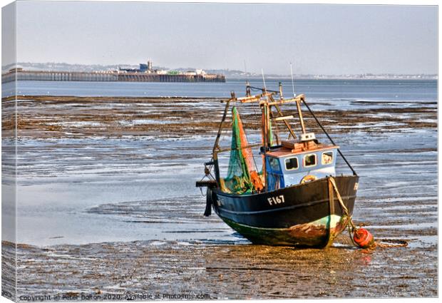 Fishing boat and Southend on Sea Pier, Essex, UK. Canvas Print by Peter Bolton