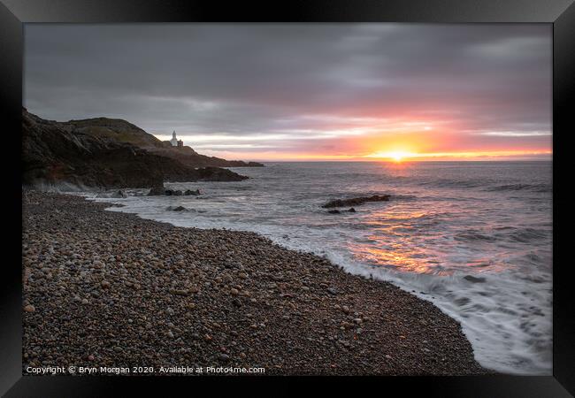 Mumbles lighthouse viewed from Bracelet bay Framed Print by Bryn Morgan