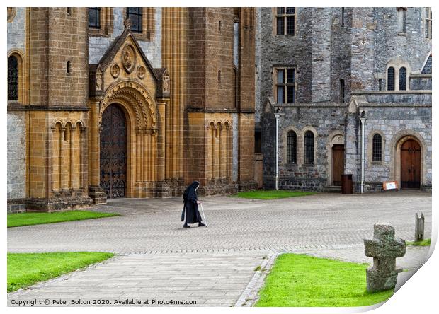 A nun crosses the courtyard at Buckfast Abbey, Dev Print by Peter Bolton